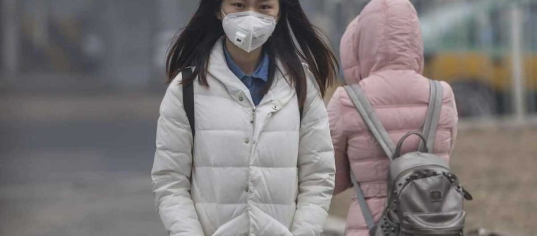 Neighborhood air pollution is associated with attenuated neurocognitive maturation over early adolescence